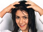 Chăm sóc tóc xơ và gàu với dầu dừa